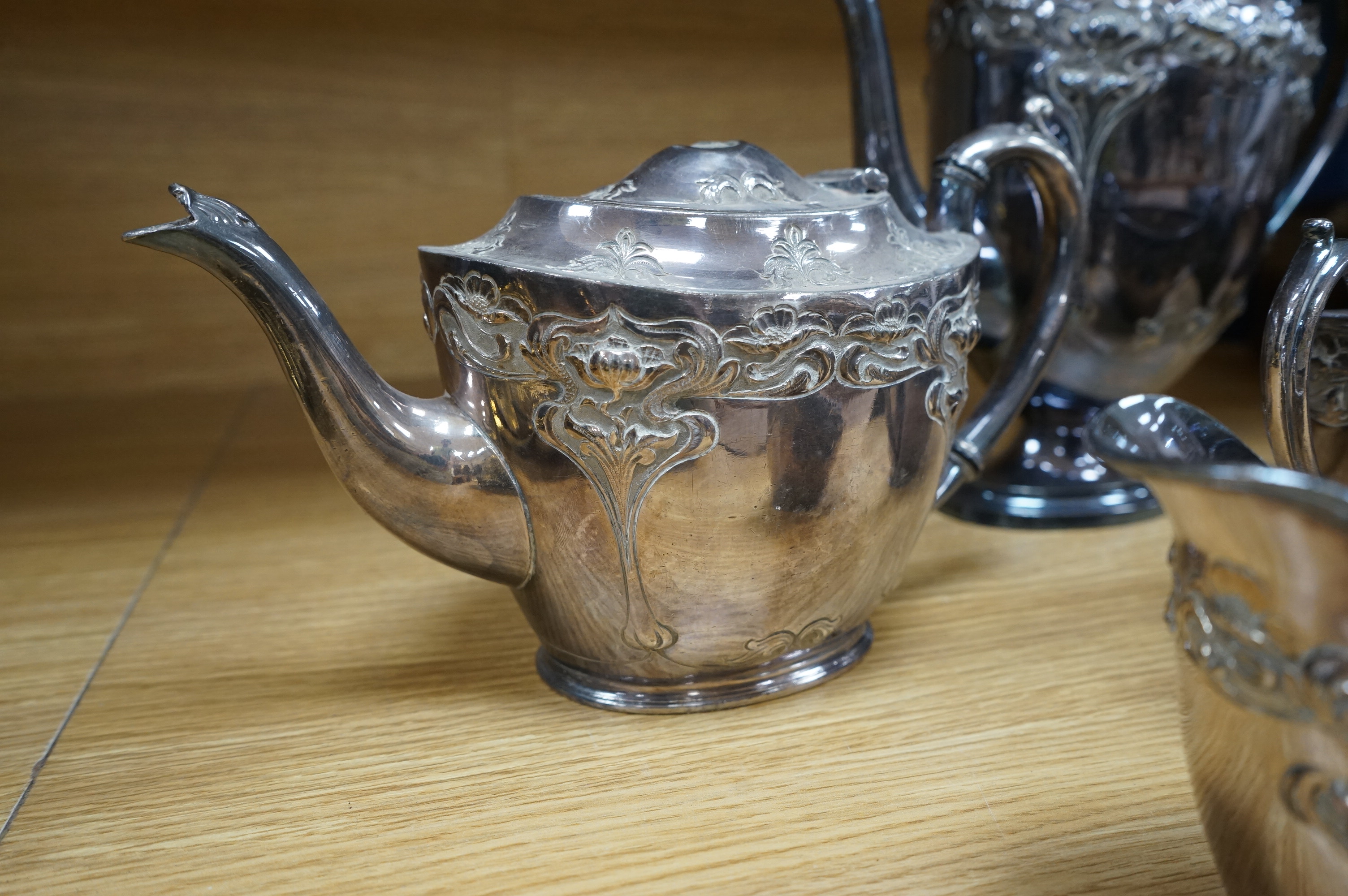 Four piece plated tea and coffee service, coffee pot 25cm high. Condition - teapot finial missing